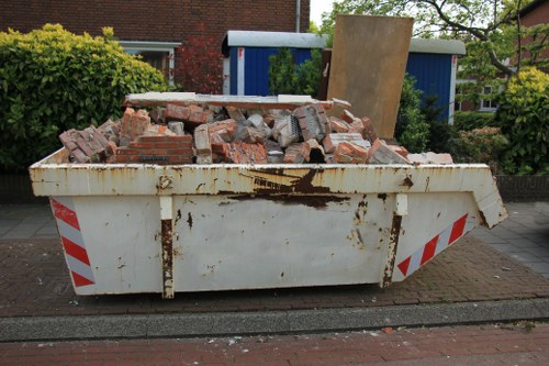 Construction site with a skip in Bethnal Green