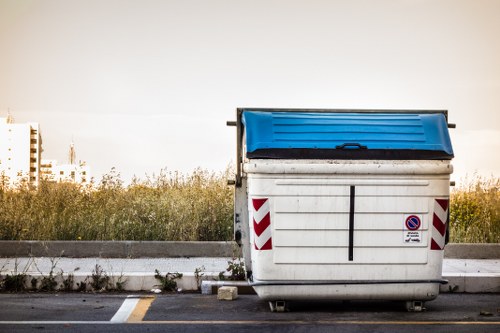 Household skip placement in a garden in Bethnal Green