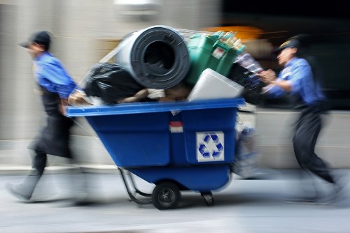 Loading waste into an enclosed and lockable skip
